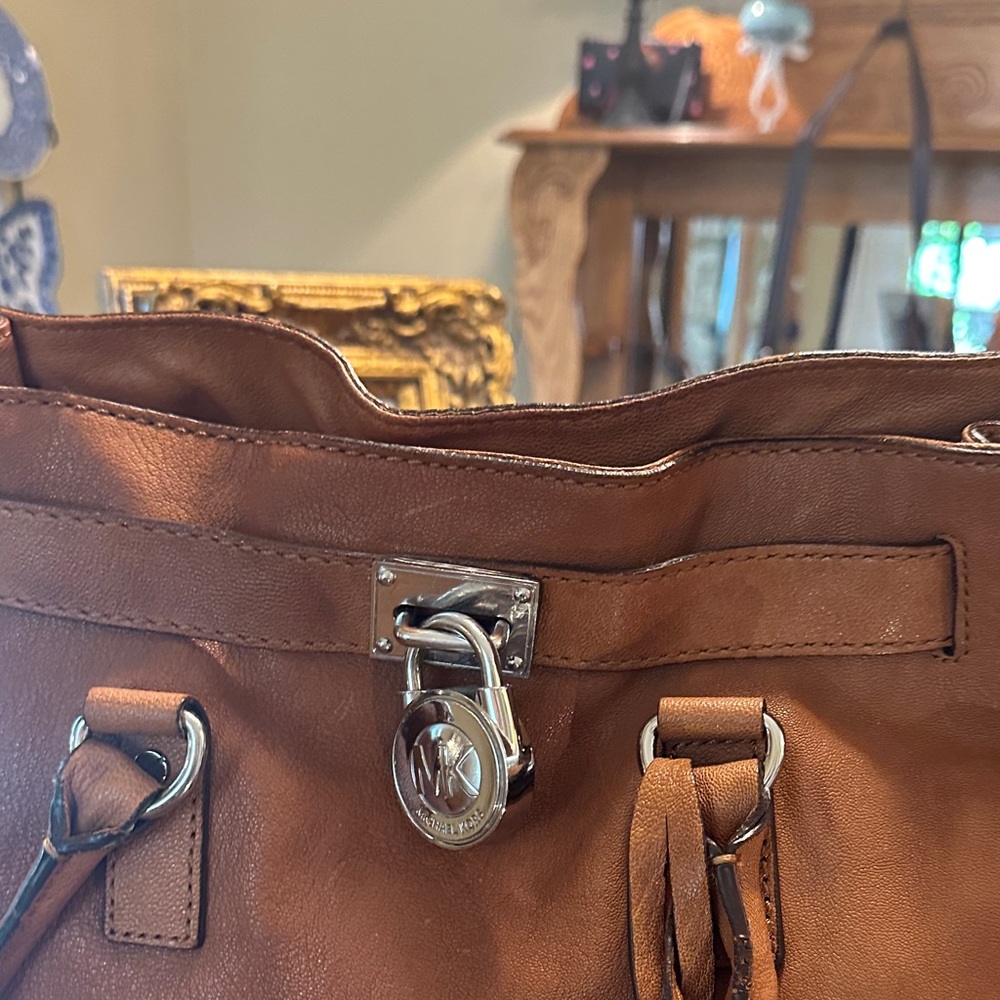 Micheal Kors Hampton Bag!! Still sells for 100-250
This bag keeps its value! - Picture 9 of 10
